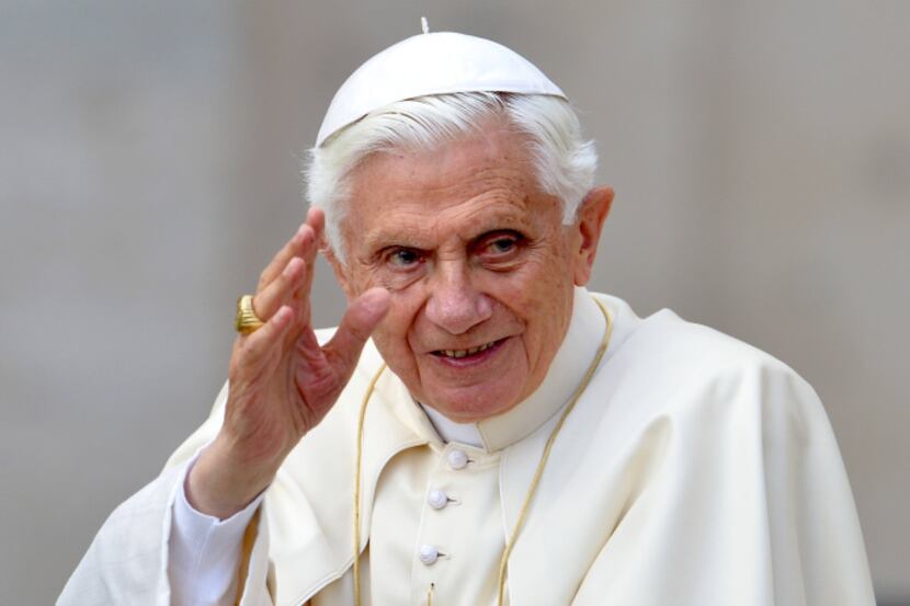 Pope Benedict XVI waved to pilgrims from his "popemobile" upon arriving in St. Peter's...