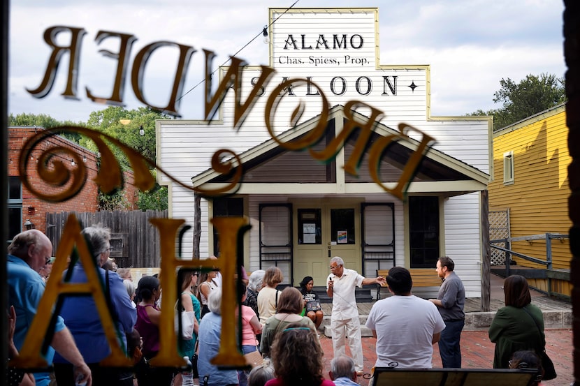 Historian Donald Payton (with microphone) discusses the history of Dallas outside the old...