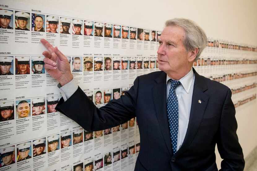 In this Oct. 25, 2017, photo, Rep. Walter Jones, R-N.C. points at a photograph of Marine...