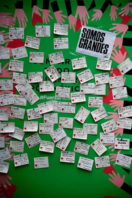 A board in Mexico City is full of messages of encouragement and pleas for assistance after a...
