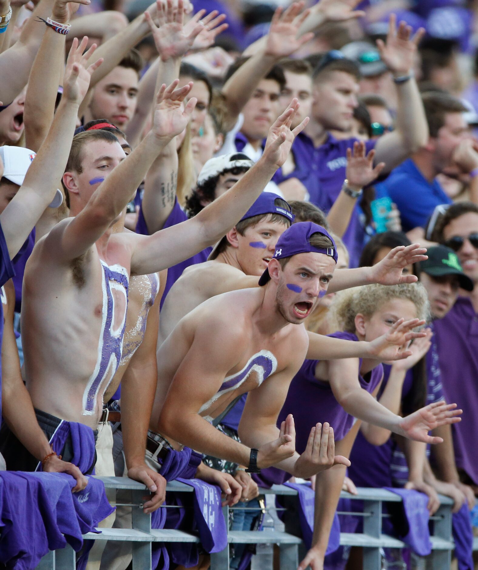 TCU fans enjoy the explosive offensive showing by the Horned Frogs in the second half during...