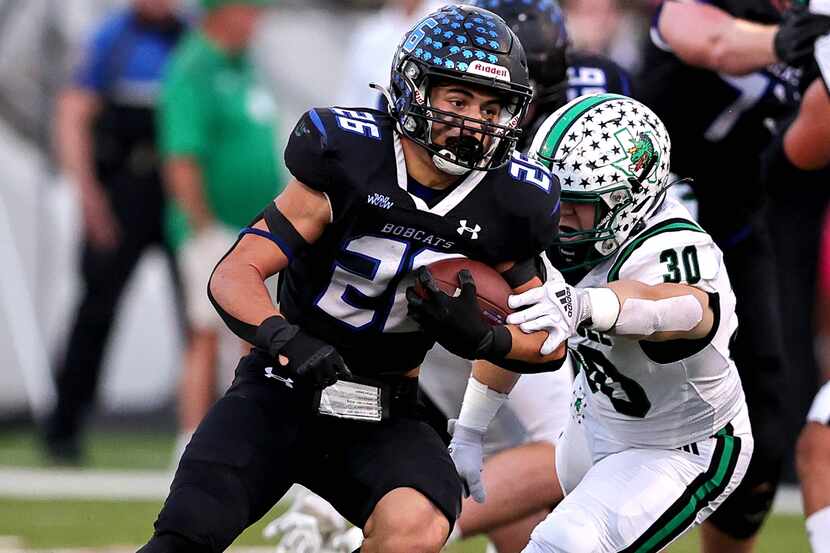 Byron Nelson running back Tucker James (26) finds a nice hole to run past Southlake Carroll...