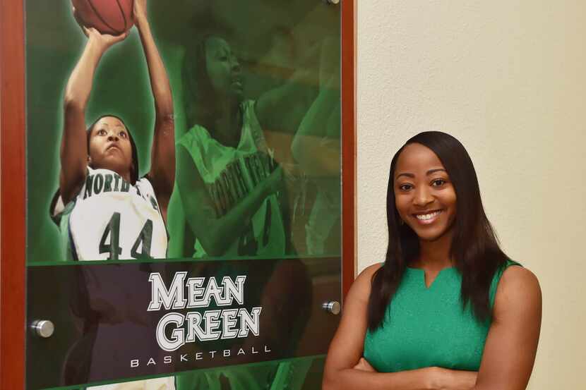 New UNT head women's basketball coach Jalie Mitchell by a photo of her when she was a 4 year...