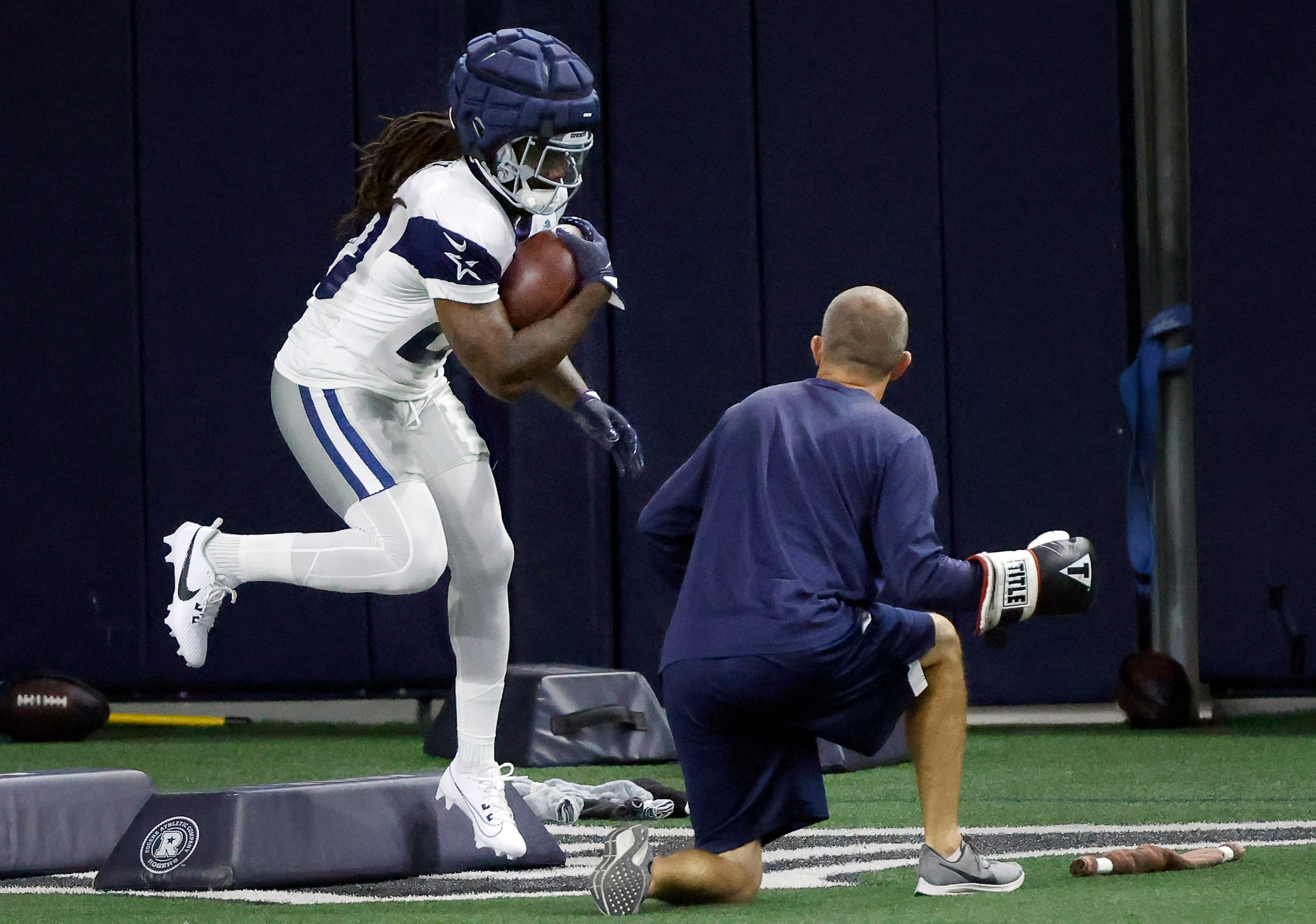 Dallas Cowboys running back Dalvin Cook (20) carries the ball during training camp practice...