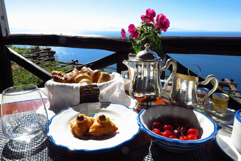 Fresh fruit, a heaping bread basket, and Sfogliatella Santa Rosa pastries -- a specialty for...