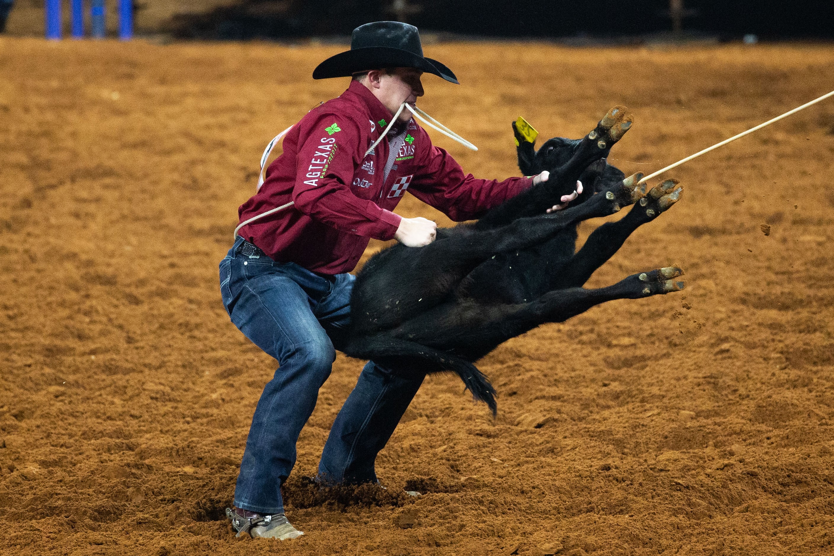 PRCA Tie Down Roping contestant Marty Yates wins the first round of his event with a time of...