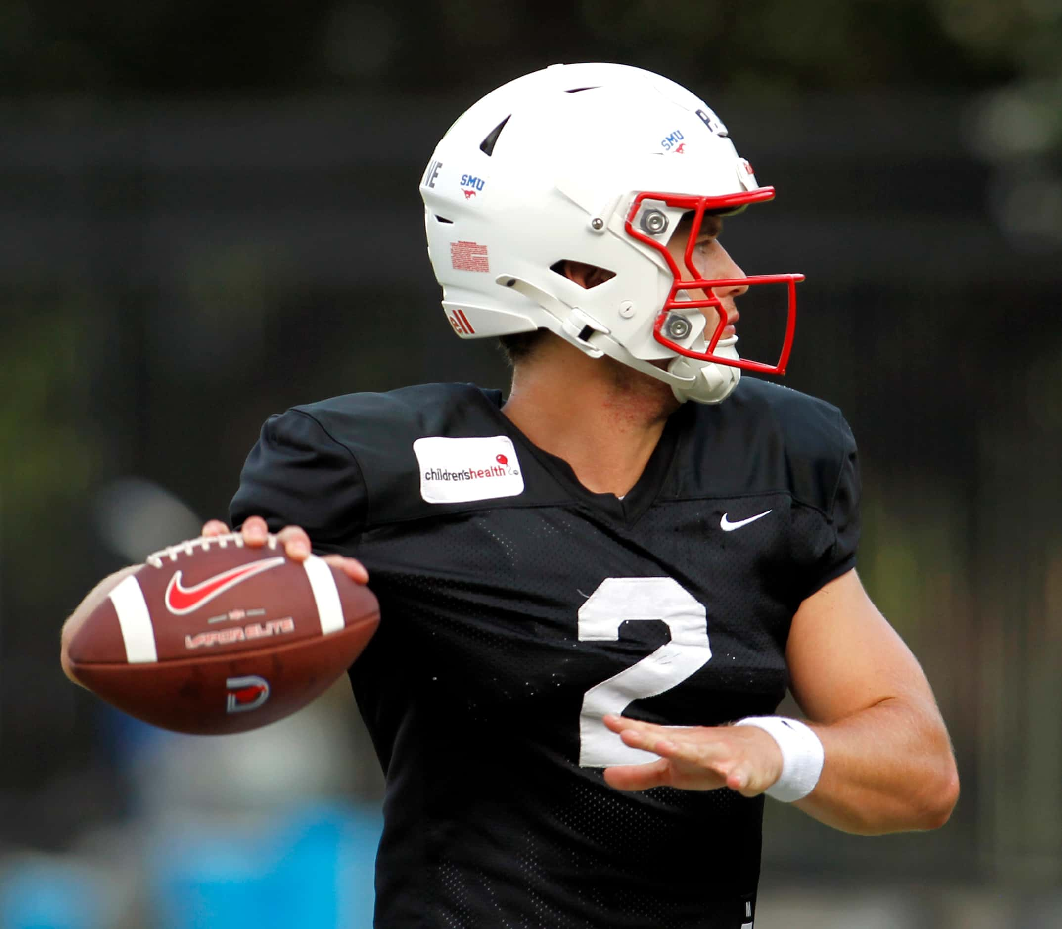 SMU Mustangs starting quarterback Preston Stone (2), prepares to pass during a team practice...