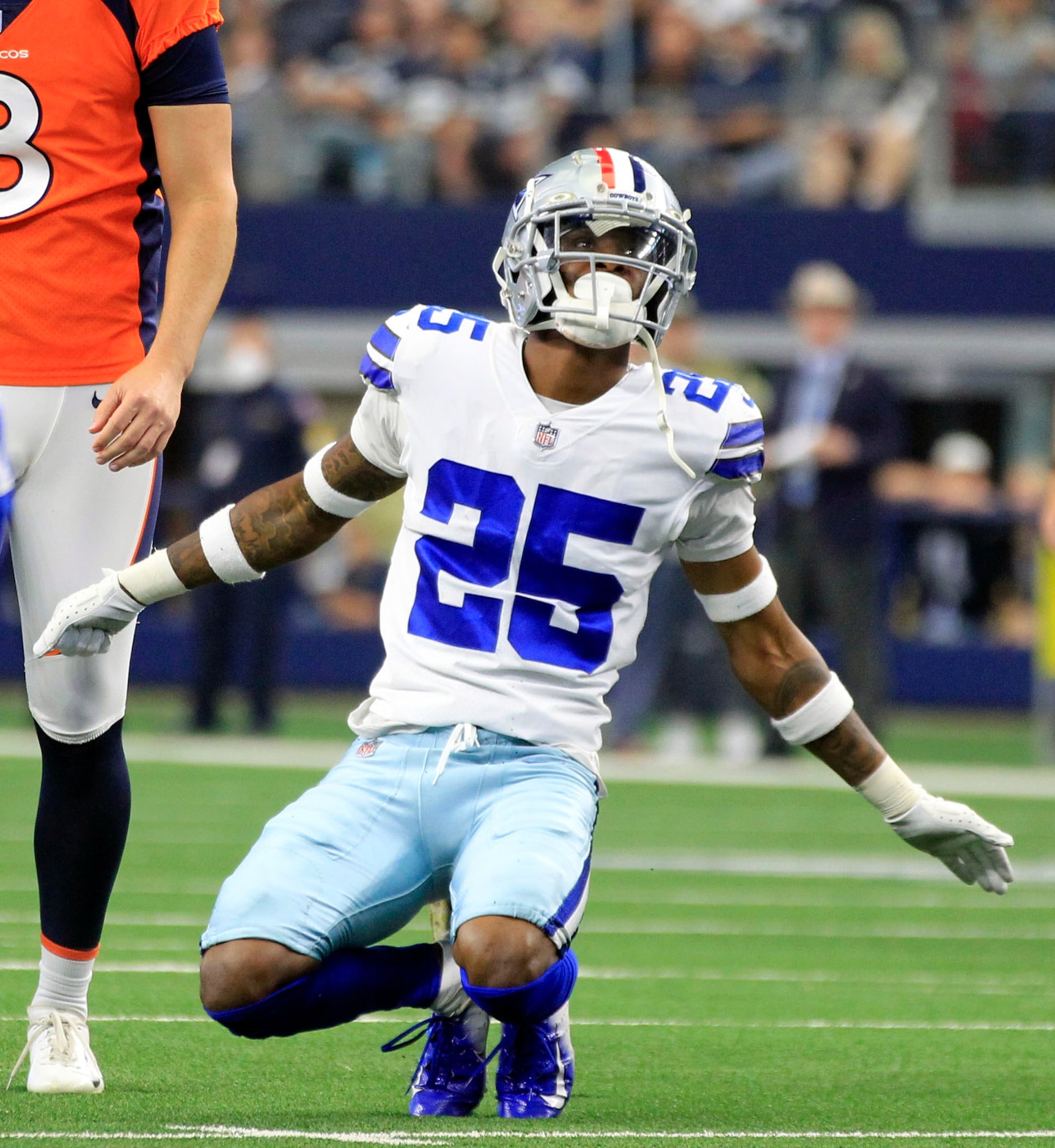 Dallas Cowboys cornerback Nahshon Wright (25) watches a successful Denver field goal attempt...