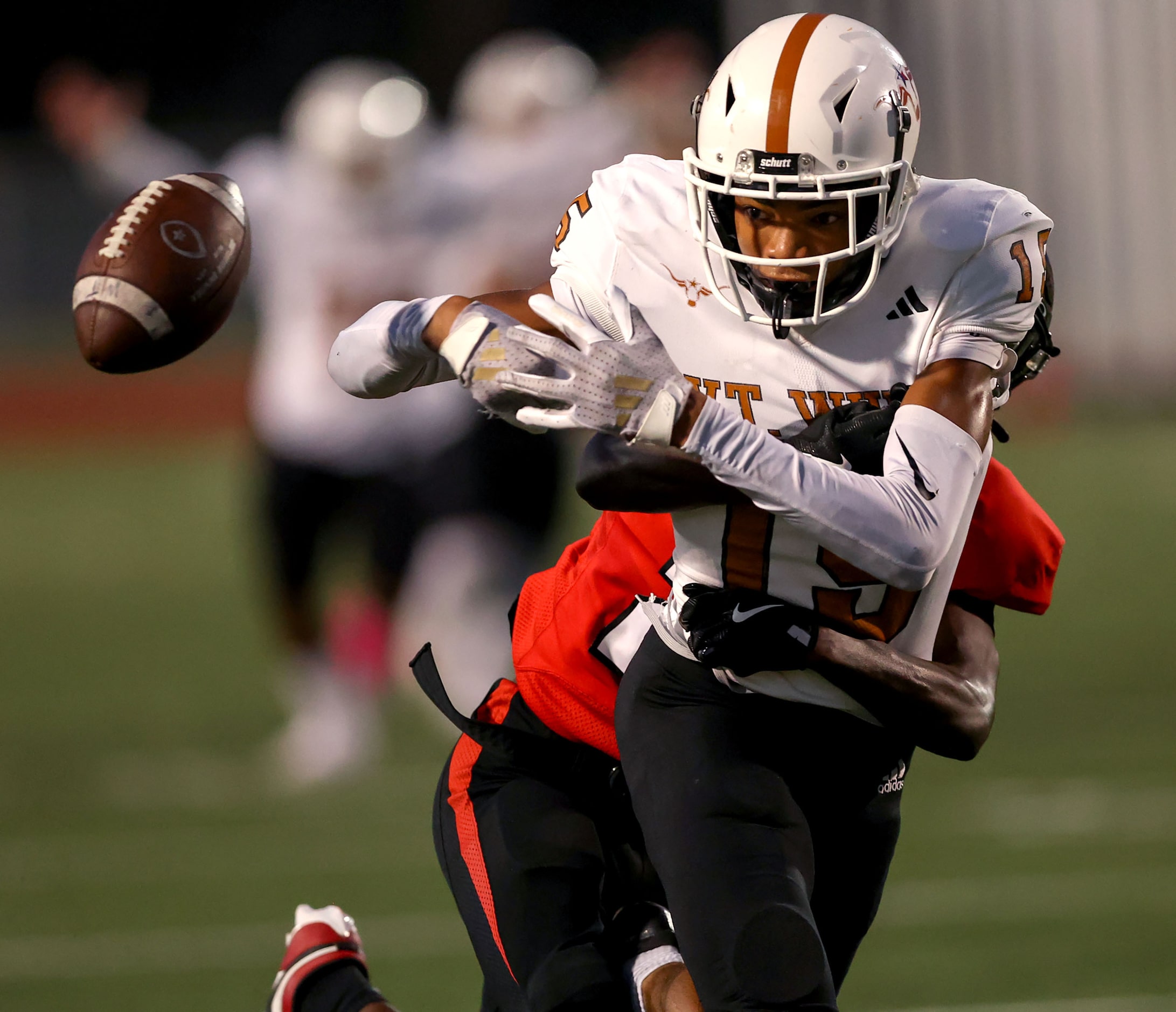 W.T. White wide receiver Lovell Neal (15) fumbles the ball against Creekview defensive back...