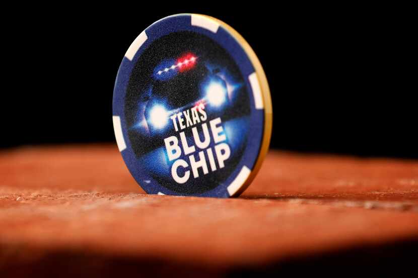 A Texas Blue Chip, a blue poker chip law enforcement officers can exchange for free,...
