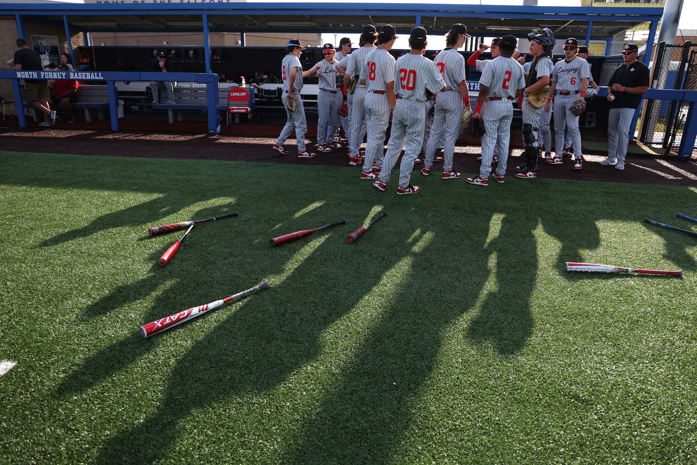 Lucas Lovejoy players assemble in front of the dugout after team warm-ups prior to the start...