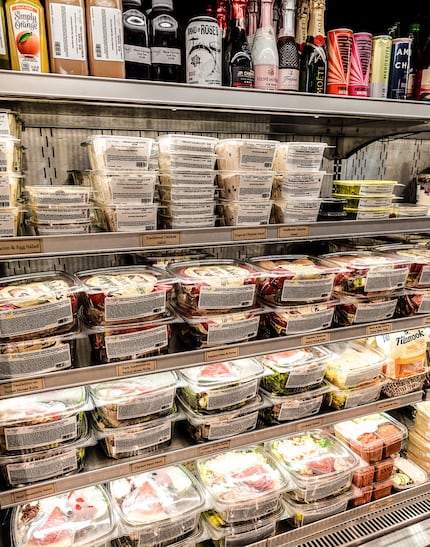 Refrigerated cases at Tres Market, a Houston-based food retailer that labels its prepared...