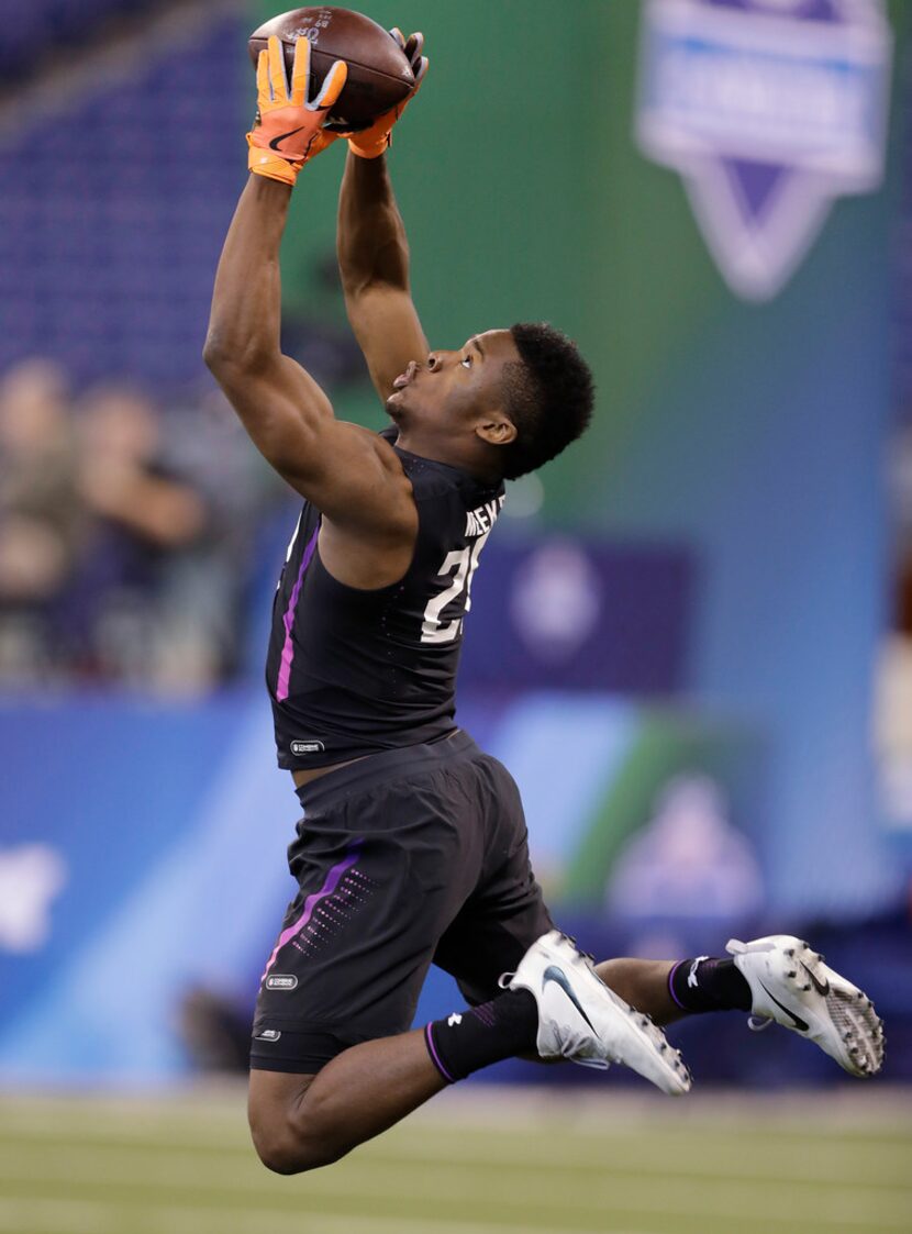 Florida State defensive back Tarvarus McFadden runs a drill during the NFL football scouting...