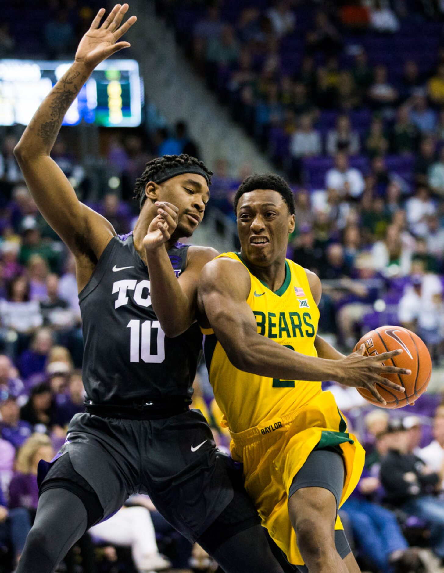 Baylor Bears guard Devonte Bandoo (2) gets around TCU Horned Frogs forward Diante Smith (10)...