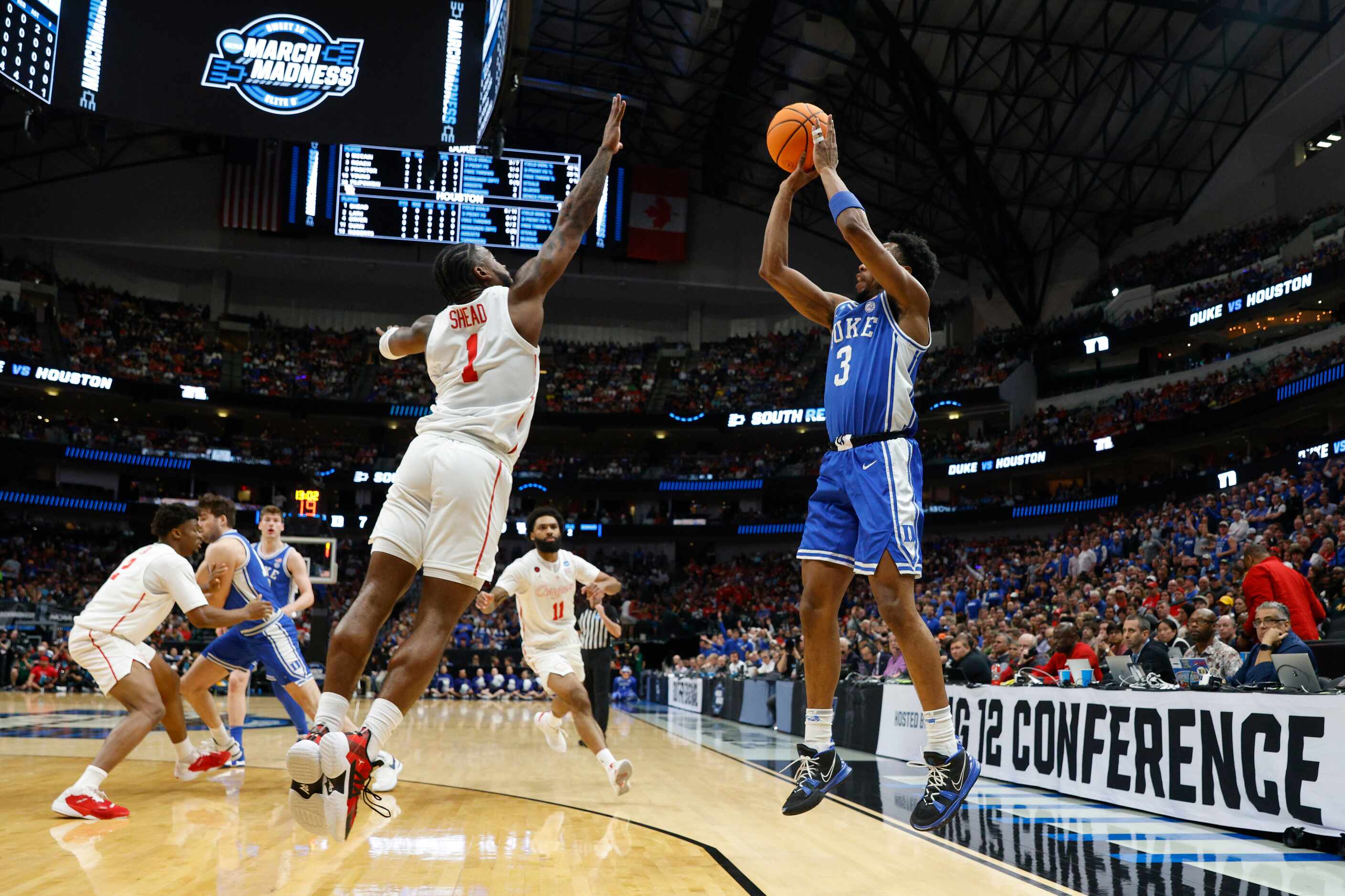 Duke guard Jeremy Roach (3) shoots over Houston guard Jamal Shead (1) during the first half...