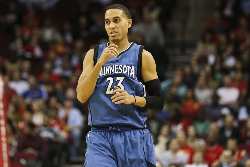 Minnesota Timberwolves guard Kevin Martin (23) reacts after making a basket during the...