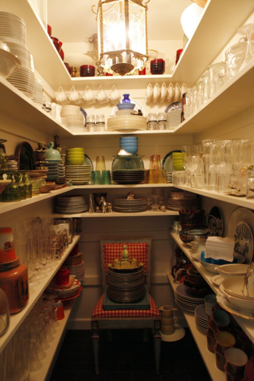 A generous closet stores the household's table settings.