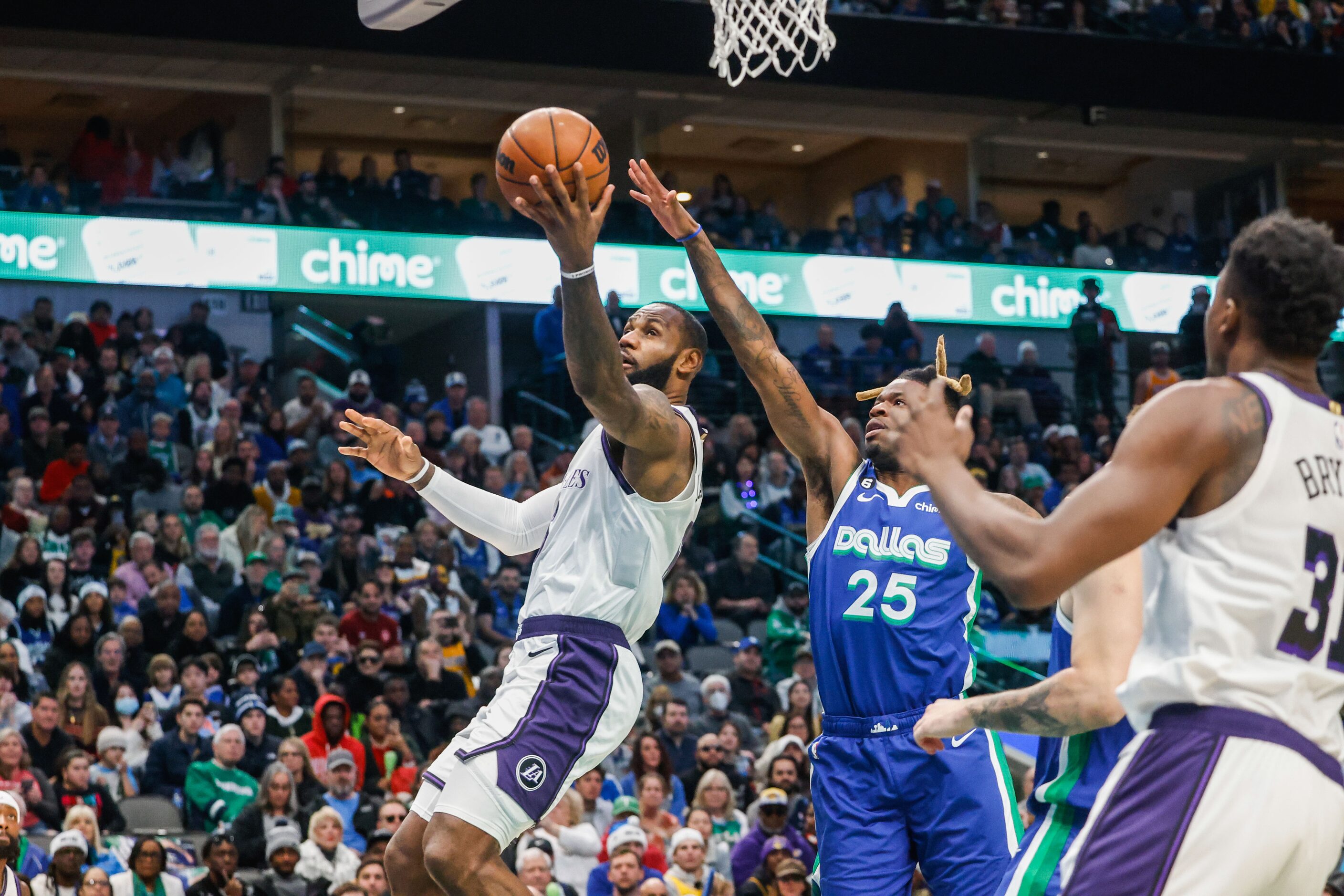 Los Angeles Lakers forward LeBron James (6) goes for a shot as Dallas Mavericks forward...