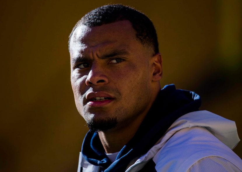 Dallas Cowboys quarterback Dak Prescott (4) warms up before their game against the...