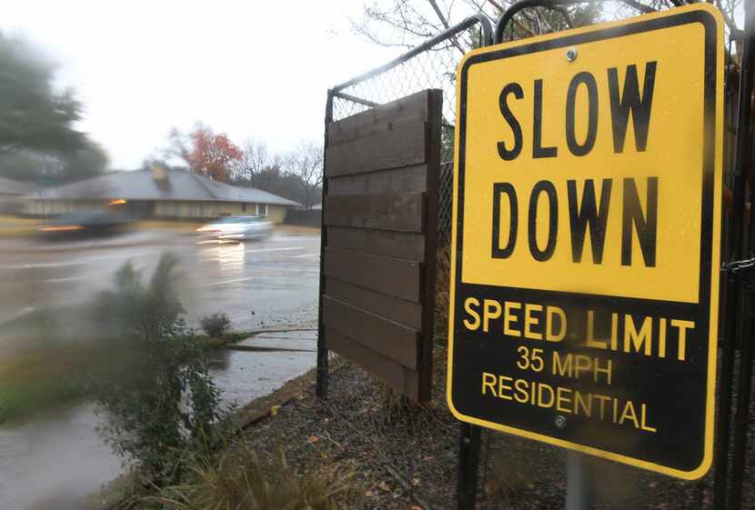 A homeowner along Abrams Road in Lakewood posted a sign urging drivers to obey the speed limit.