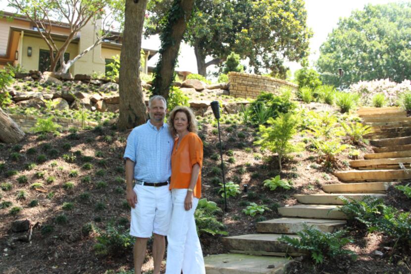 Bill and Julia Koch reconstructed their home, but also changed the entire landscaping in the...