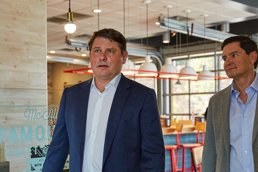 McAlister's Deli president Joe Guith (left) and Sun Holdings CEO Guillermo Perales (right)...