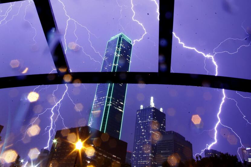 Lightning strikes are seen over downtown Dallas Tuesday, May 26, 2015. (Nathan Hunsinger/The...
