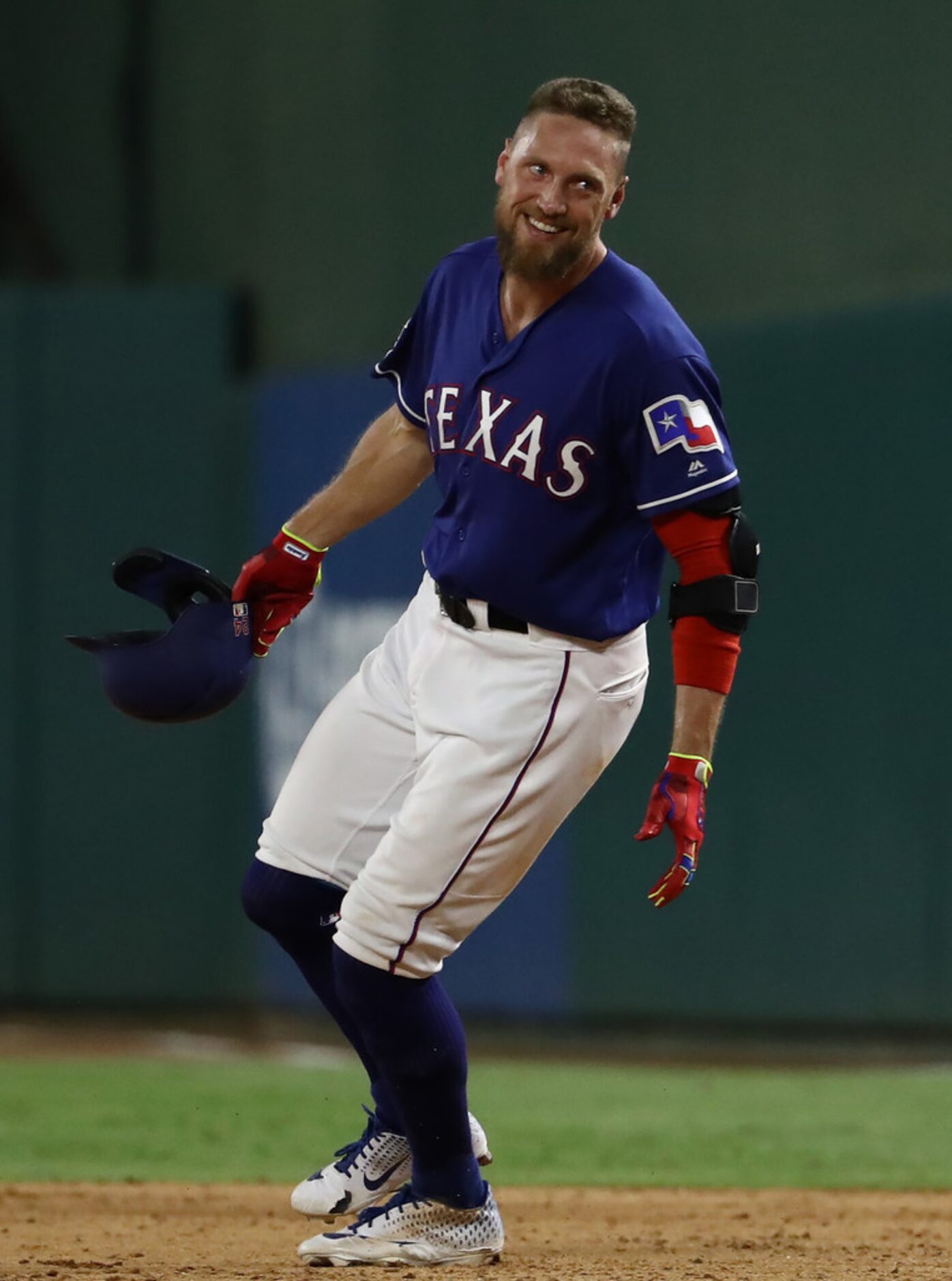 ARLINGTON, TEXAS - AUGUST 21:  Hunter Pence #24 of the Texas Rangers celebrates a walk off...