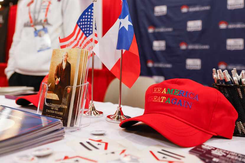 A cap reading “Make America Great Again” sits on the table of Log Cabin Republican during...