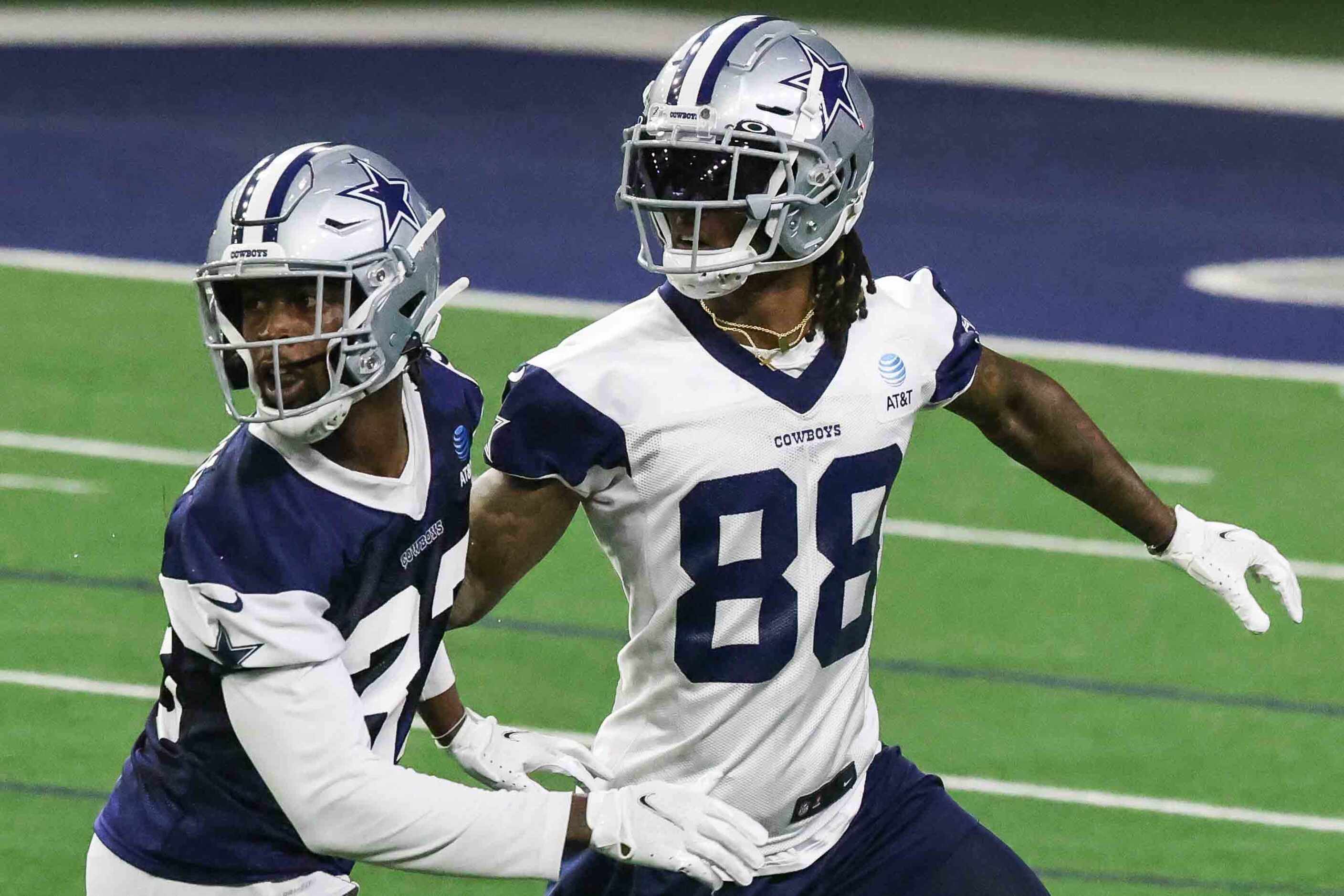 WR CeeDee Lamb, 88, and CB Deante Burton, 33, during the Cowboys' full-squad offseason...