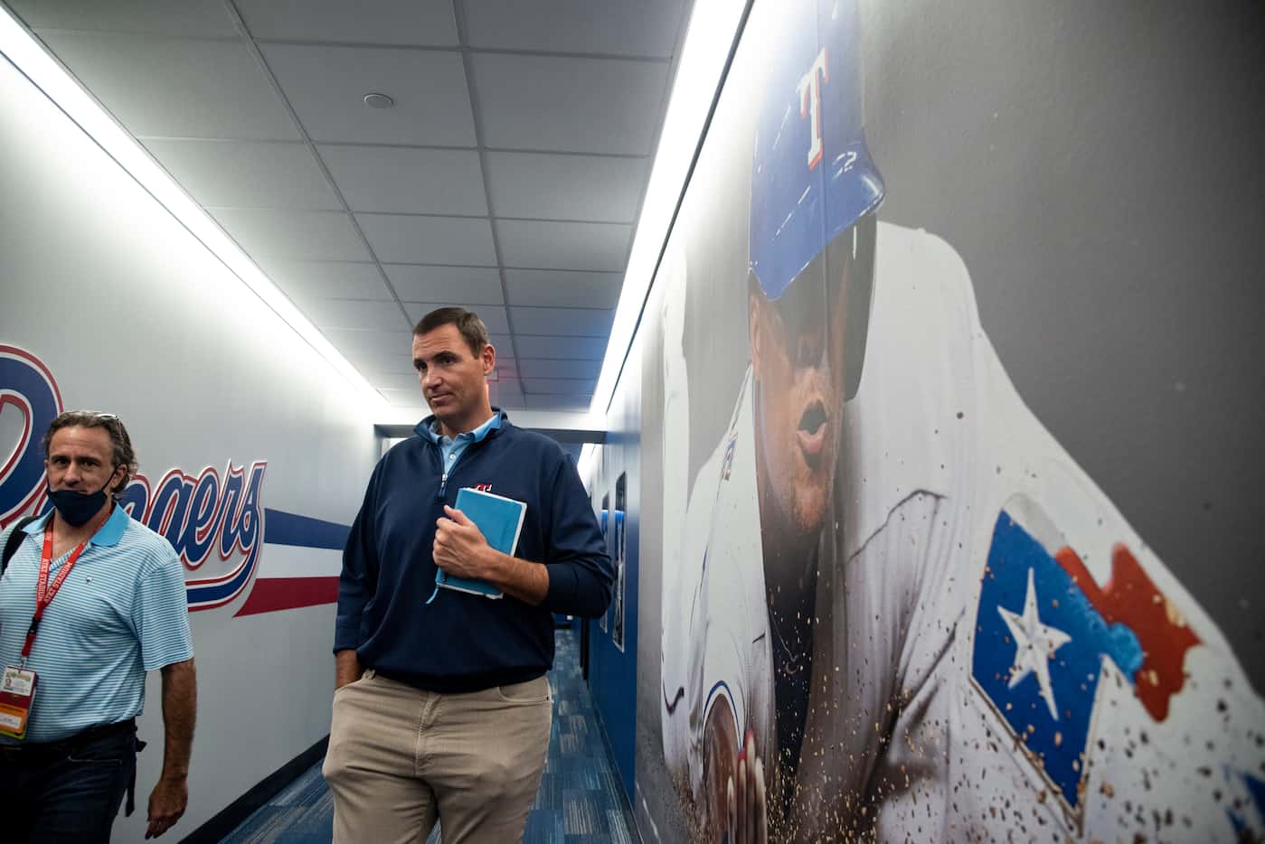 Texas Rangers Executive Vice President and General Manager Chris Young talks to a reporter...