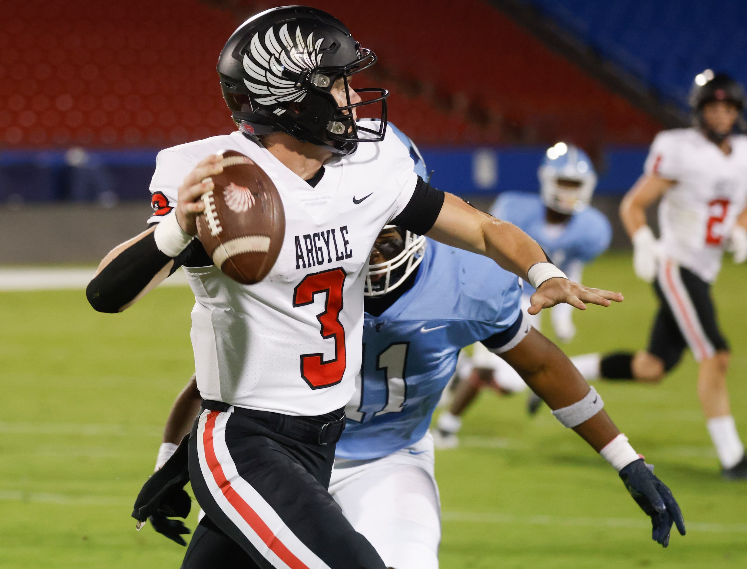 Argyle’s QB Jacob Robinson (3) throws the ball against Emerson during the first half of a...