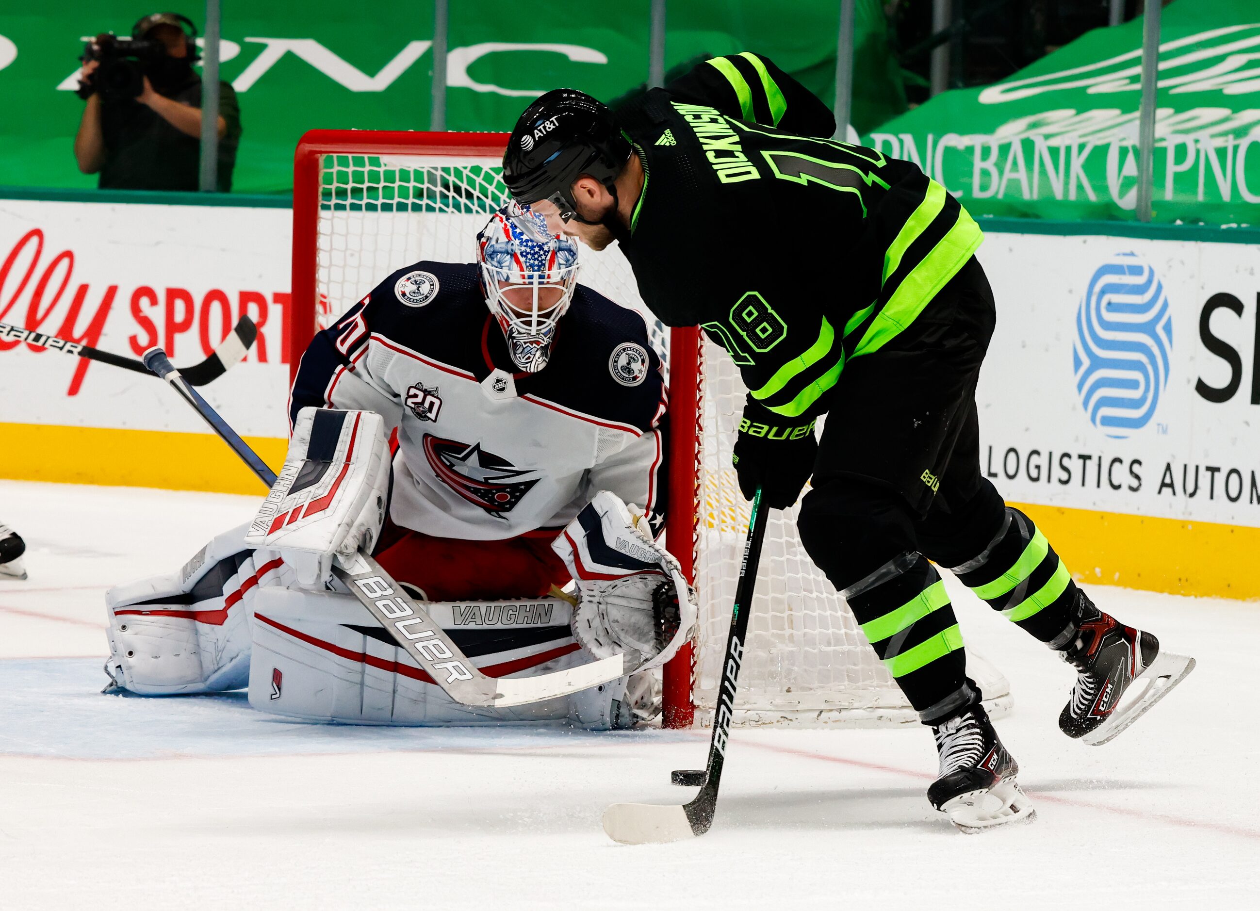 Columbus Blue Jackets goaltender Joonas Korpisalo (70) blocks Dallas Stars center Jason...