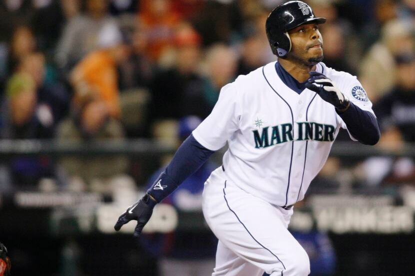 FILE - This is an Oct. 3, 2009, file photo showing Seattle Mariners' Ken Griffey Jr. hitting...
