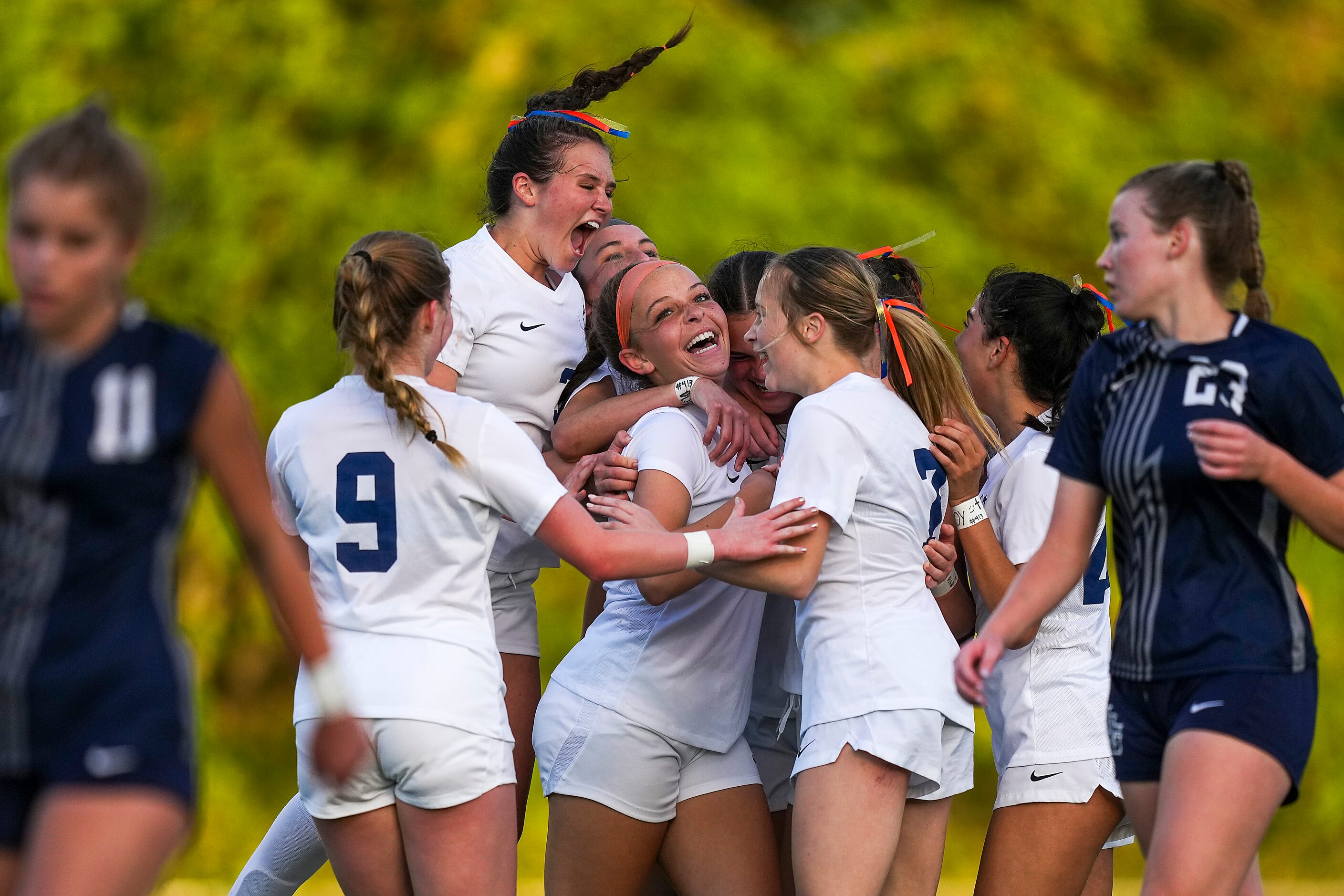 Frisco Wakeland’s Finley McKnight (facing) celebrates with Dilan Pistorius as their...