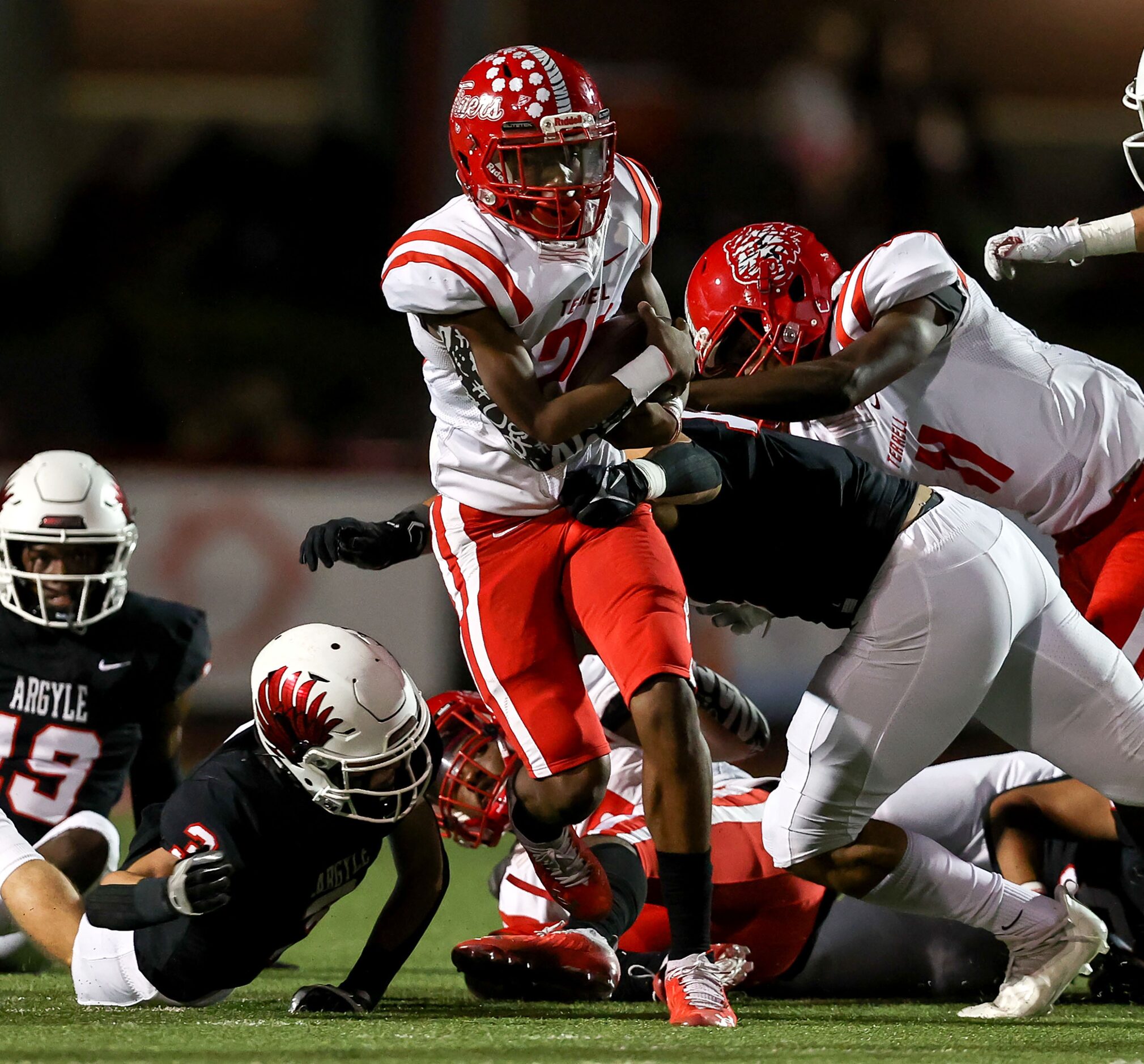 Terrell running back Draden Fullbright (22) tries to finds some room to run against Argyle...