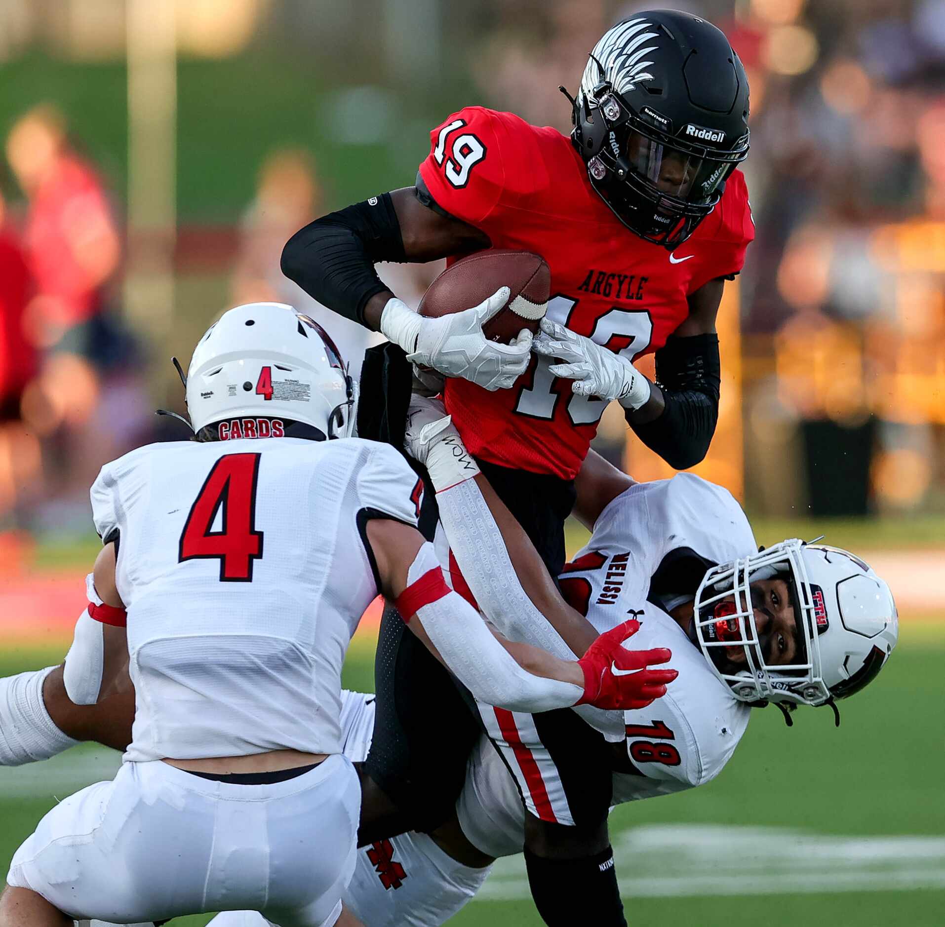 Argyle wide receiver Ja'Qwan Felton (19) tries to break a tackle against Melissa's Clark...