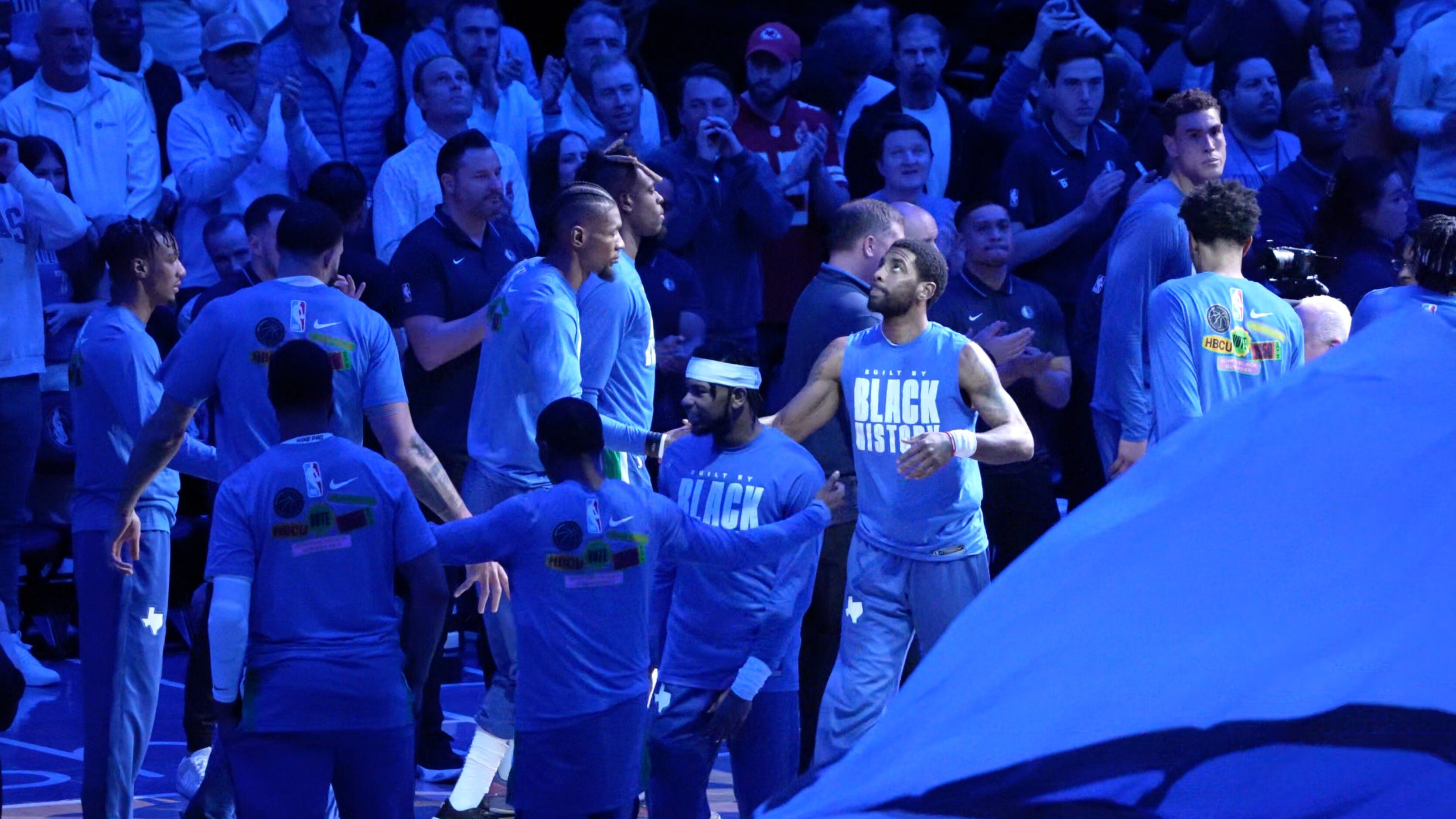 Dallas Mavericks guard Kyrie is introduced to the crowd before an NBA basketball game...