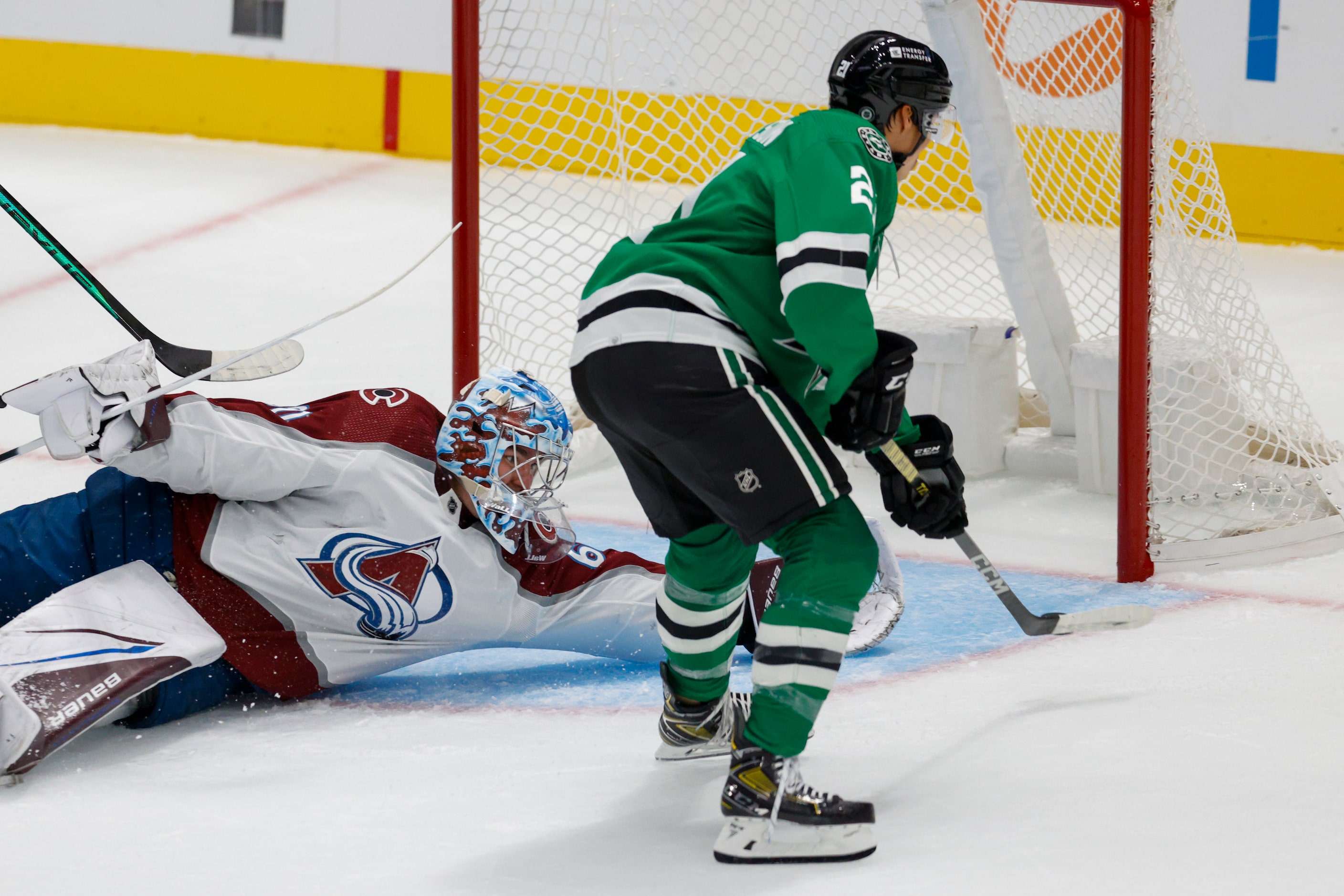 Dallas Stars left wing Jason Robertson (21) scores a goal past Colorado Avalanche goaltender...