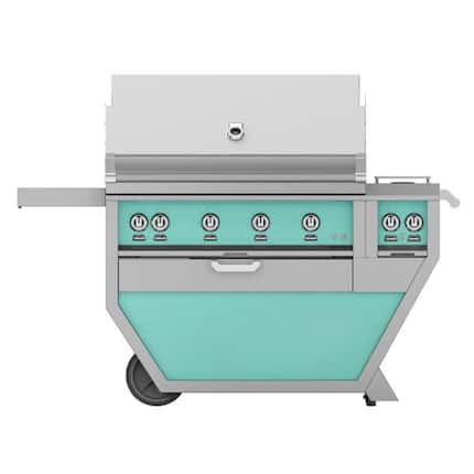 Gas grill in silver and blue-green, with large hood, knobs on front and wheels