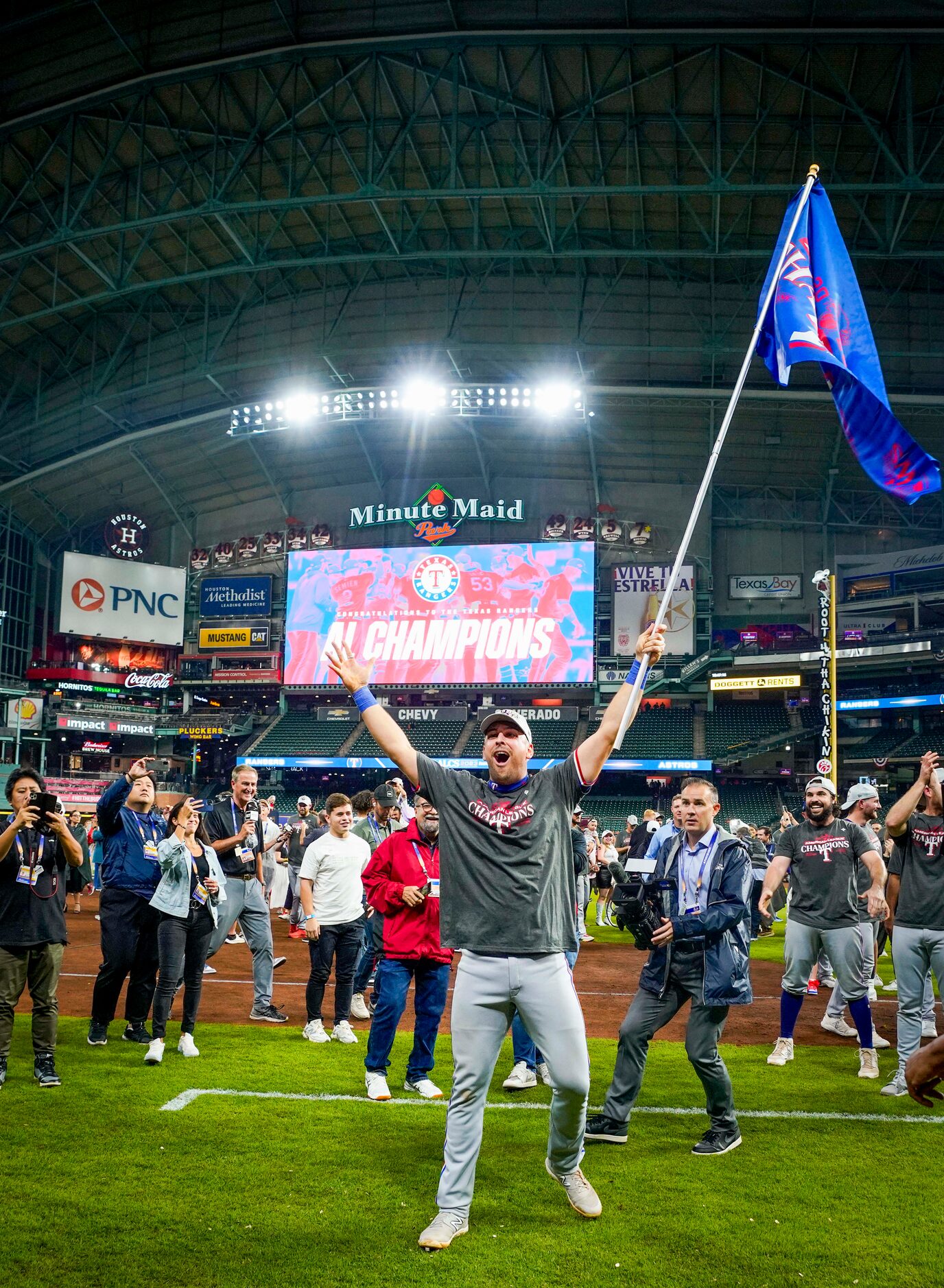 Texas Rangers first baseman Nathaniel Lowe celebrates after a victory over the Houston...