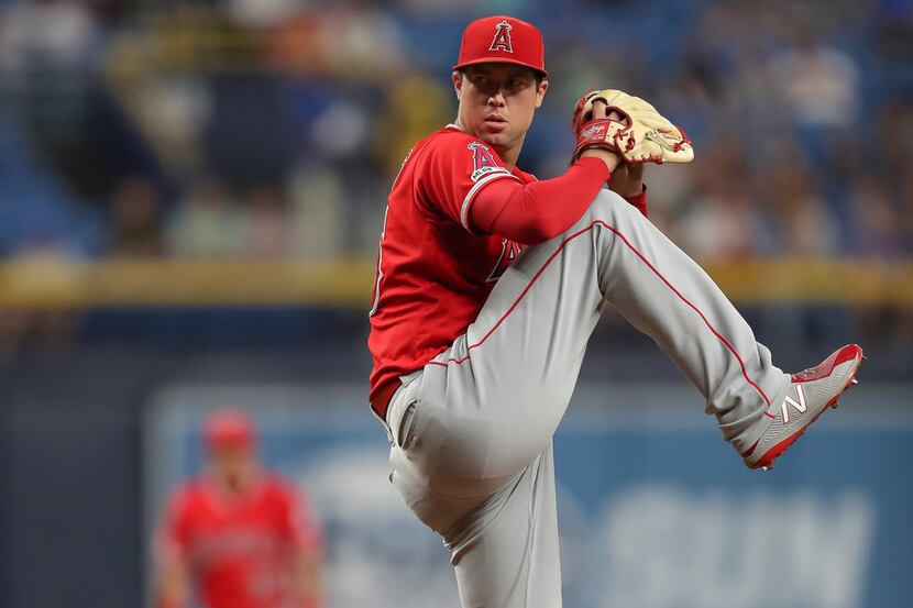 ST. PETERSBURG, FL - JUNE 13: Tyler Skaggs #45 of the Los Angeles Angels throws in the first...