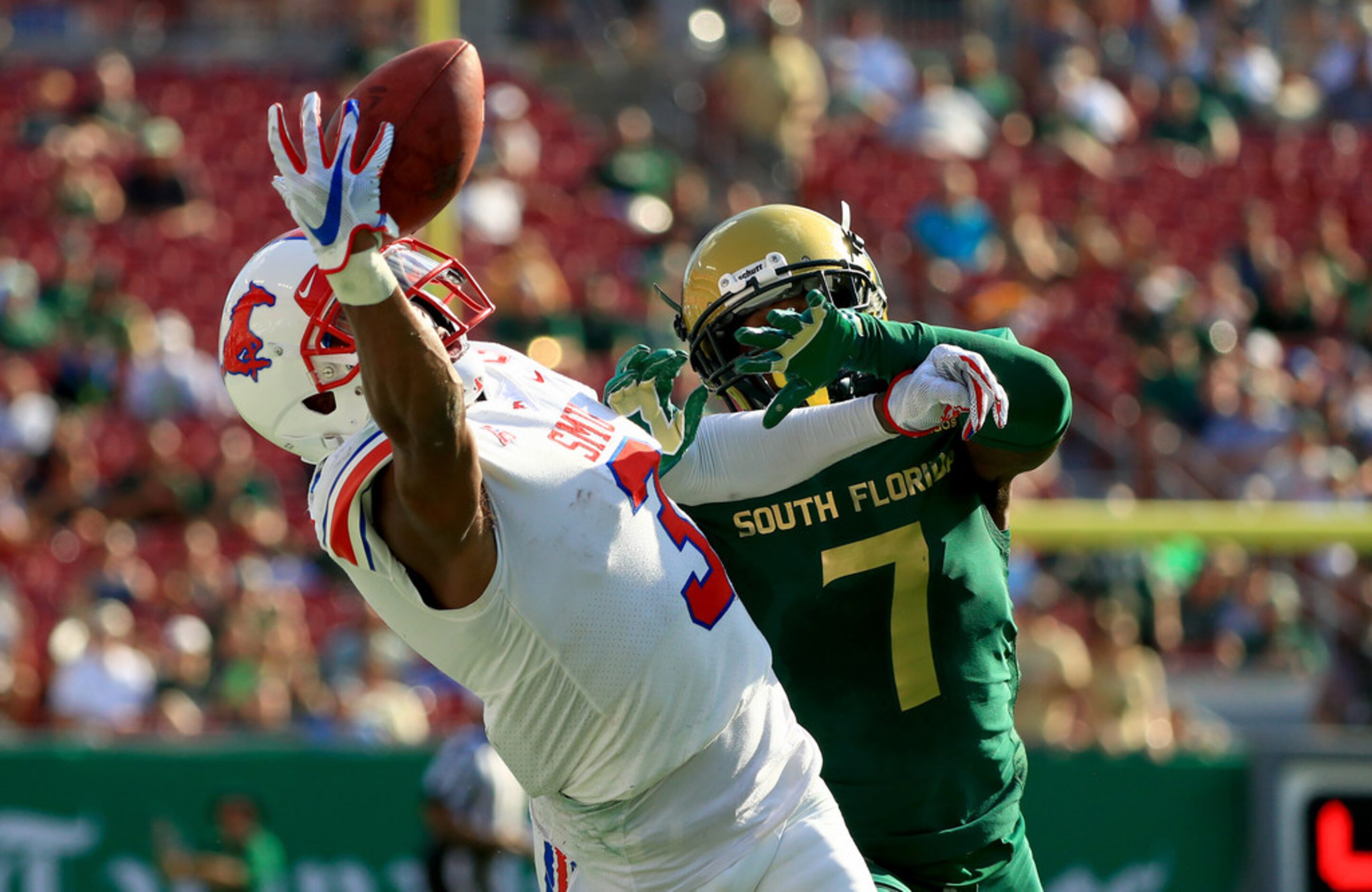 TAMPA, FLORIDA - SEPTEMBER 28: James Proche #3 of the Southern Methodist Mustangs makes a...