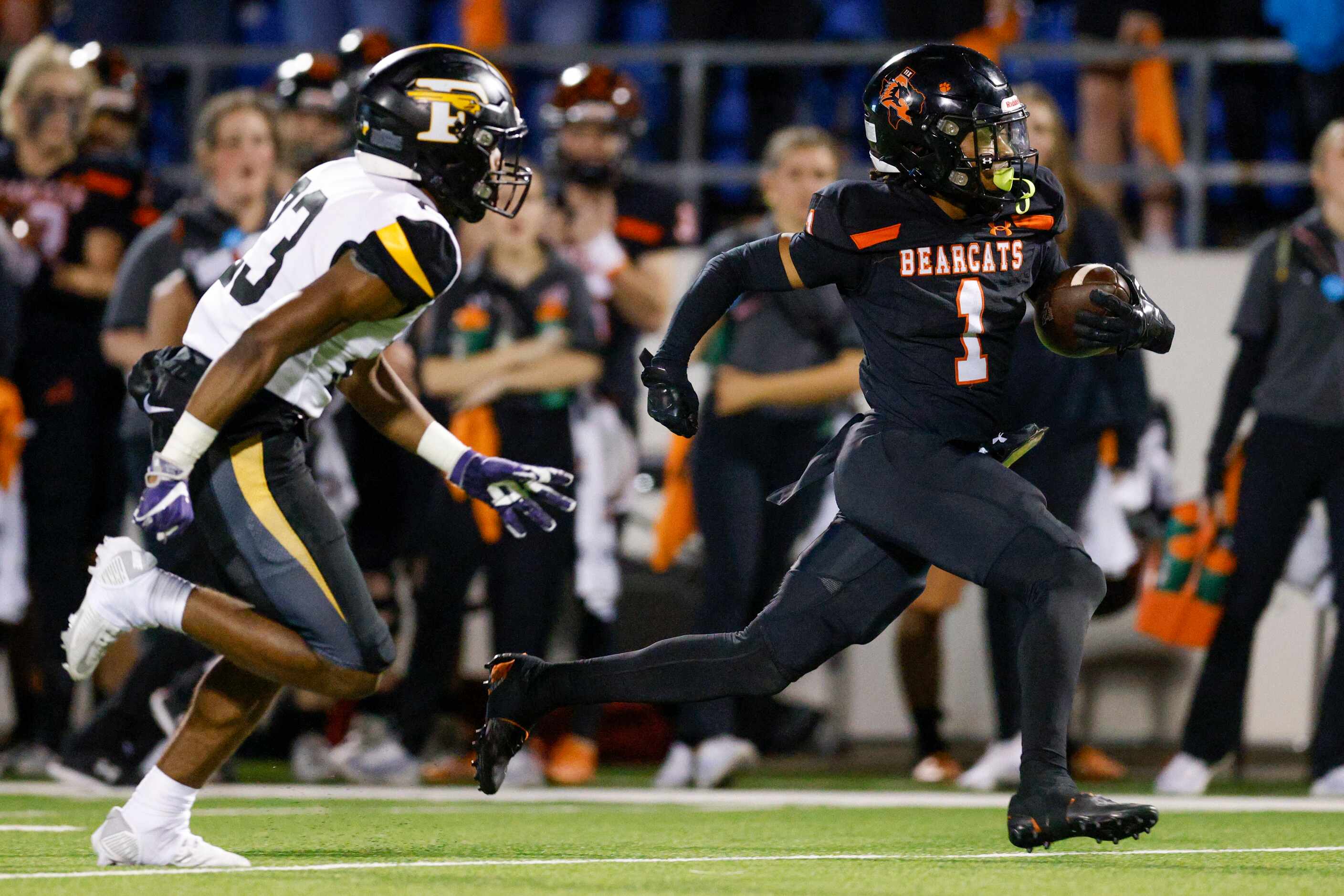 Aledo running back Hawk Patrick-Daniels (1) races down the field ahead of Forney defensive...