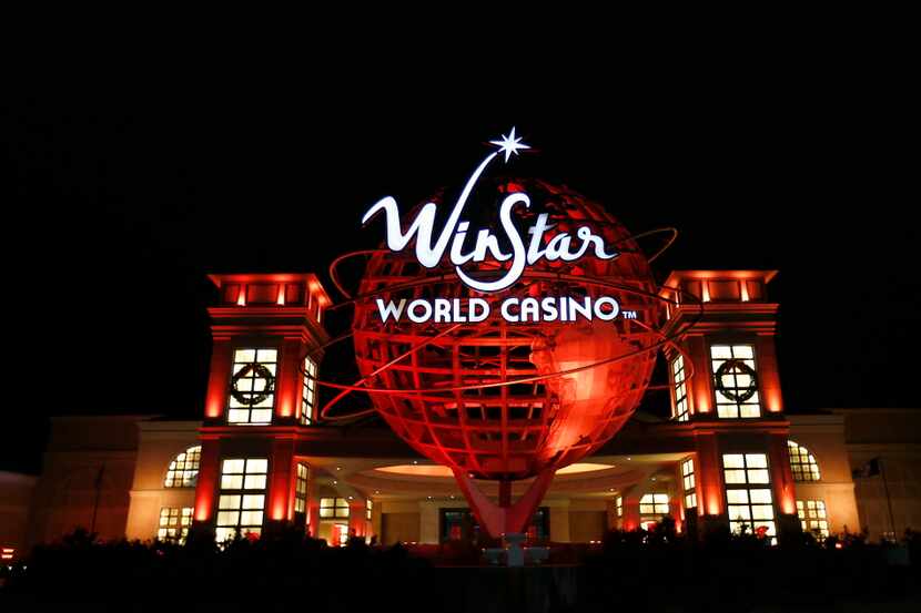 A WinStar World Casino and Resort symbol stands at the Grand Entrance on Saturday, Nov. 28,...