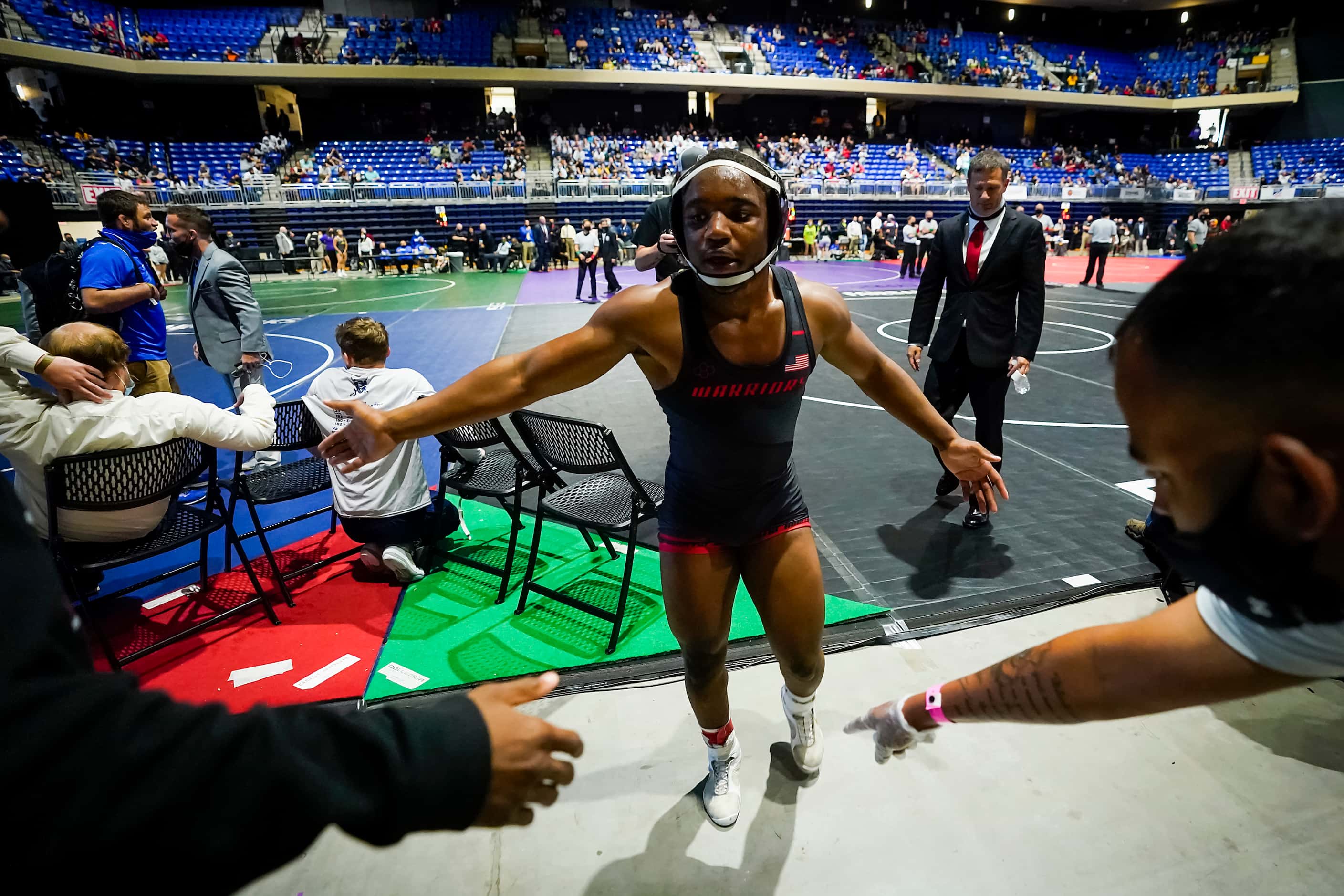 Donavan Whitted of Arlington Martin celebrates after defeating Roberto Bautista of Klein for...