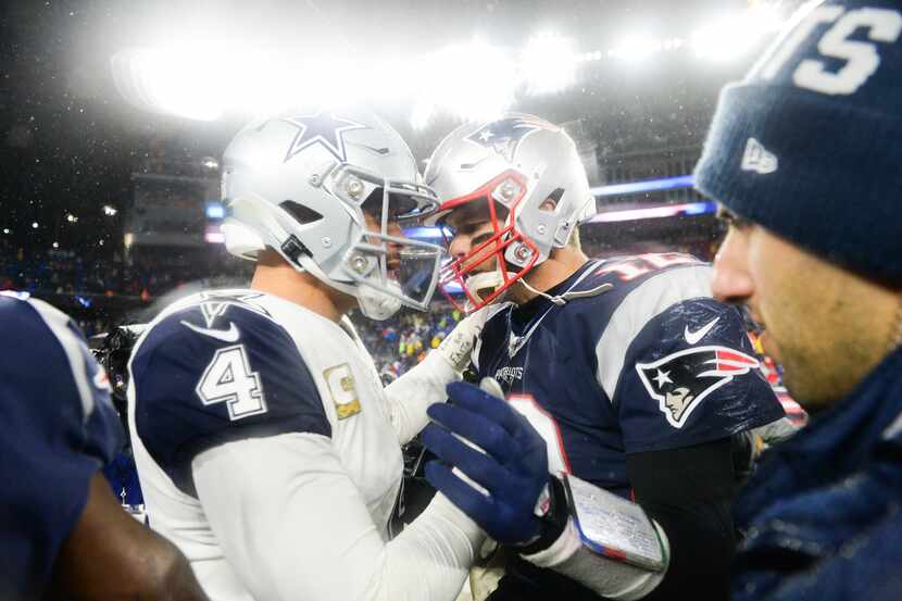 FOXBOROUGH, MA - NOVEMBER 24: Dak Prescott #4 of the Dallas Cowboys shakes hands with Tom...