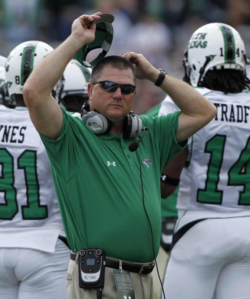 ORG XMIT: NYMG109 North Texas head coach Todd Dodge stands on the field during a time out in...