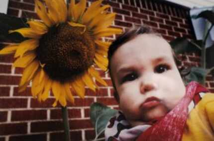  Here is Charlie Garcia with (duh) a sunflower