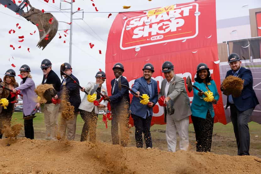 H-E-B, Joe V’s Smart Shop and local officials turn dirt during a groundbreaking ceremony for...